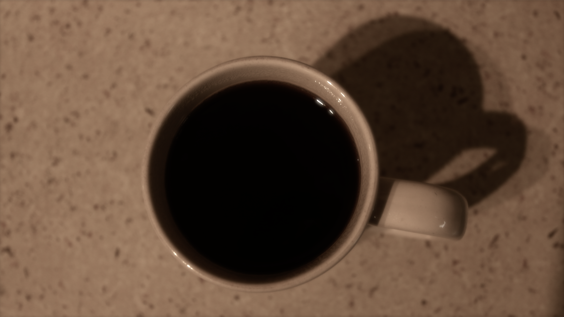 A white coffee mug with black coffee